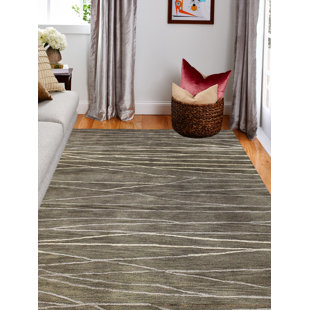 LATITUDE RUN® Farrie Handmade Brown Rug