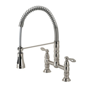 Kingston Brass Heritage Double-Handle 2-Hole Deck-Mount Pre-Rinse Bridge Kitchen Faucet