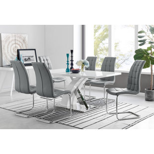 CANORA GREY Marietta Chrome Metal and White High Gloss Dining Table Set - 6 Modern Faux Leather Dining Chairs