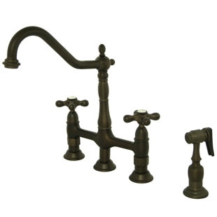 Kingston Brass Heritage Two-Handle 4-Hole Deck Mount Bridge Kitchen Faucet with Brass Side Sprayer
