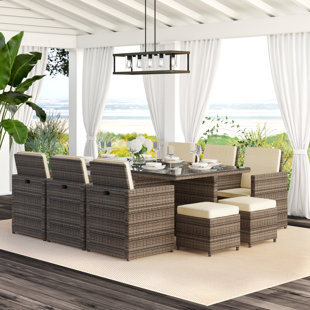 ORREN ELLIS Theone 10 - Person Rectangular Outdoor Dining Set with Cushions