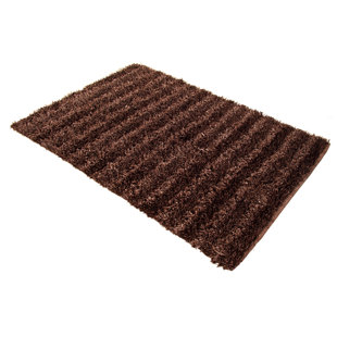 CHESAPEAKE MERCHANDISING INC. Seabury Solid Color Rug