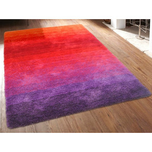 CARACELLA Teppich Dinar in Rot / Violett