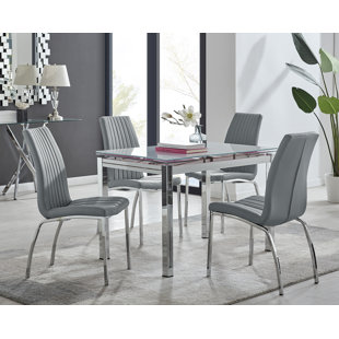 FURNITURE BOX Tierra Modern Glass & Metal Extendable Dining Table Set & 4 Luxury Faux Leather Dining Chairs