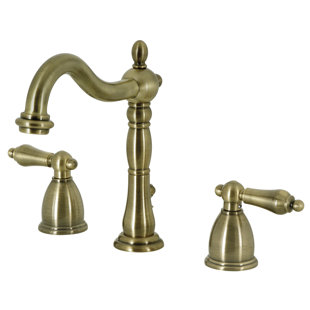Kingston Brass Heritage Two-Handle 3-Hole Deck Mount Widespread Bathroom Faucet with Pop-Up Drain