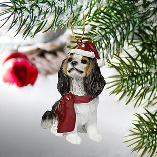 DESIGN TOSCANO Cavalier King Charles Spaniel Holiday Dog Ornament Sculpture