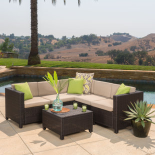 WADE LOGAN® Arville 6 Piece Rattan Sectional Seating Group with Cushions