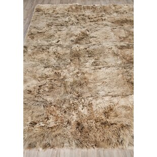 EXQUISITE RUGS Sheepskin Solid Color Rug