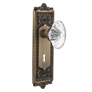 NOSTALGIC WAREHOUSE Crystal Fluted Oval Passage Door Knob with Keyhole Egg & Dart Long Plate