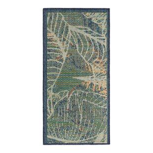 BEACHCREST HOME™ Torrence Floral Machine Made Power Loom Polypropylene Indoor / Outdoor Area Rug in Blue