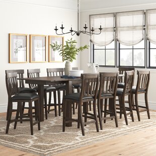 THREE POSTS™ Schoenberg 11-Piece Counter Height Extendable Solid Wood Dining Set