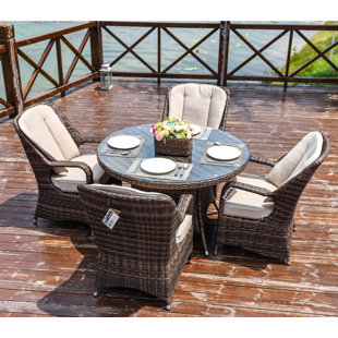 MODA FURNISHINGS Batson 4 - Person Round Outdoor Dining Set with Cushions