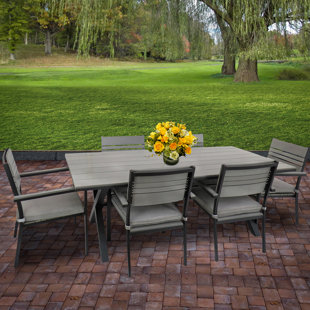 NATIONAL OUTDOOR LIVING Rectangular 6 - Person 79'' Long Dining Set with Cushions