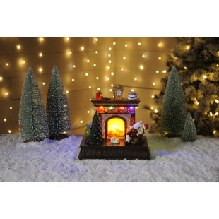 THE SEASONAL AISLE Fireplace with Moving Tree