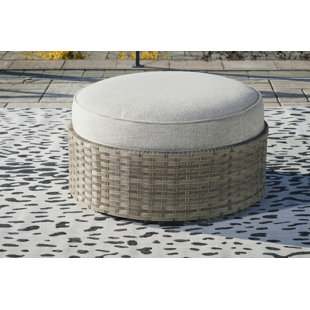 HOKKU DESIGNS Keriss Wicker Outdoor Ottoman with Sunbrella® Cushion