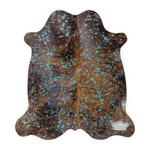 APPALOOSA COWHIDES Turquoise Devore On Brindle Cowhide Rug