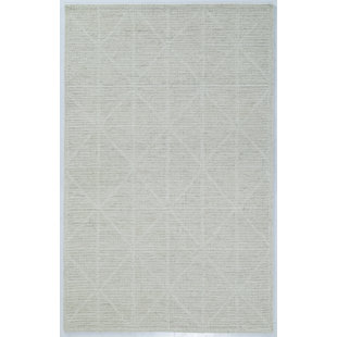NUSTORY Crossover Hand Tufted Area Rug in Beige