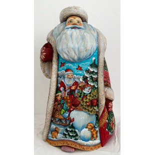 G DEBREKHT Masterpiece Wood Carved First Snow's Play Day Santa Figurine