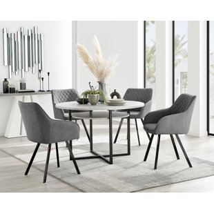 CANORA GREY Round Concrete Effect & Black Legs Dining Table With Storage Shelf & 4 Luxury Velvet Dining Chairs