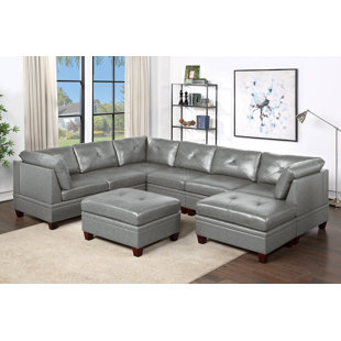 F&L HOMES STUDIO 132'' Wide Genuine Leather Reversible Modular Corner Sectional with Ottoman