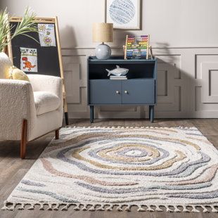 WROUGHT STUDIO™ Adette Abstract Swirl Kids Tassel Area Rug