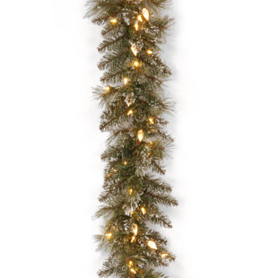 THE HOLIDAY AISLE® 9 ft. Glittery Bristle Pine Garland with Warm White LED Lights