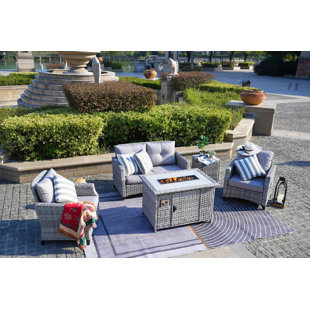 RED BARREL STUDIO® 4 - Person Outdoor Seating Group with Cushions