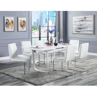 ANDREW HOME STUDIO Aaly 7 - Piece Extendable Sled Dining Set