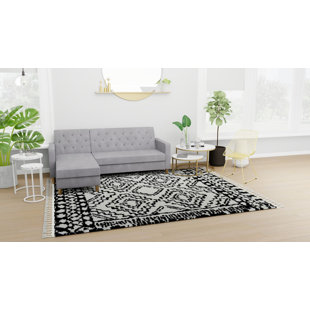 COSMOLIVING BY COSMOPOLITAN Mason Shag Tribal Heath Black Area Rug
