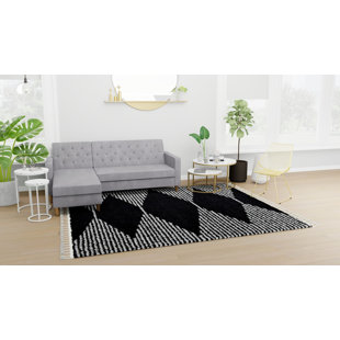 COSMOLIVING BY COSMOPOLITAN Mason Shag Tribal Heath Black Area Rug