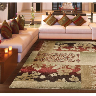 THE CONESTOGA TRADING CO. Conestoga Ogletree Floral Rouge Stain Resistant Area Rug