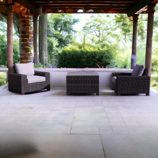 COURTYARD CASUAL FURNITURE 3 Piece Rattan Seating Group with Cushions