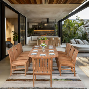 CHIC TEAK 11 Piece Teak Wood Outdoor Patio Dining Set Including Oval Double Extension Table With 10 Abaco Side Chairs