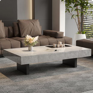 CREATURE B COMFORTS Simple rectangular rock slab floating coffee table