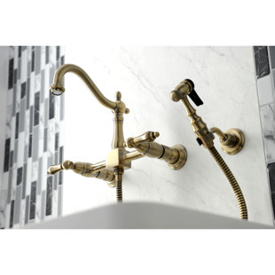 Kingston Brass Heritage Double-Handle 3-Hole Wall-Mount Bridge Kitchen Faucet with Brass Sprayer