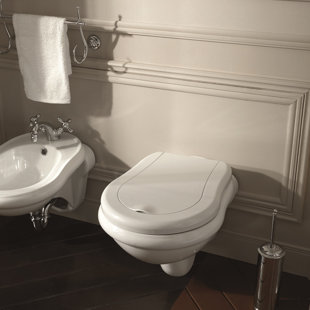 WS Bath Collections Retro 1.28 GPF Elongated Wall Mounted Wall Hung Toilets (Seat Included)