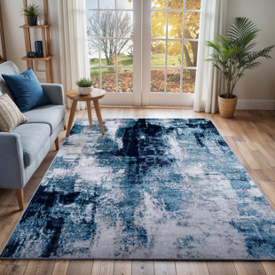 SURYA B.V. Abstract Area Rug