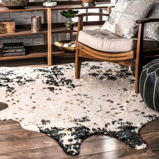 UNION RUSTIC Chehalis Contemporary Faux Cowhide Power Loom Black/Gold Rug