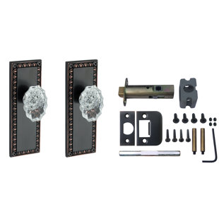 KNOXX HARDWARE Calvert Crystal Egg and Dart Passage Door Knob with Rosette