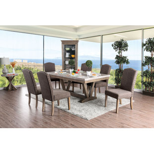ANDREW HOME STUDIO Rimrock 7 - Piece Trestle Dining Set