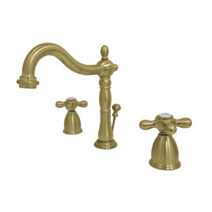Kingston Brass Heritage Two-Handle 3-Hole Deck Mount Widespread Bathroom Faucet with Pop-Up Drain
