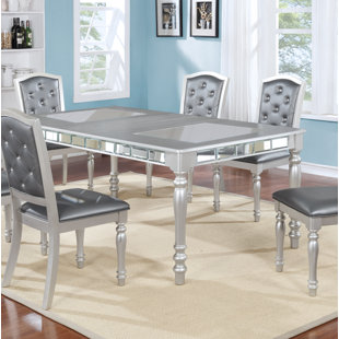 UNITED FURNITURE IMPORT & EXPORT 7 - Piece Extendable Glass Top Dining Set