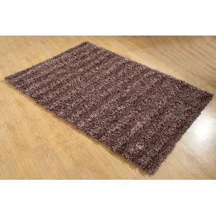 CHESAPEAKE MERCHANDISING INC. Seabury Handmade Shag Taupe Area Rug