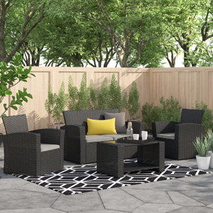 EBERN DESIGNS Pamalee 4 Piece Rattan Sofa Seating Group with Cushions