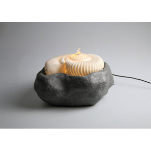 AM-DESIGN FLORISTIK GMBH Brunnen aus Stein mit Licht