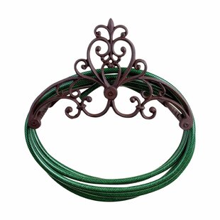 ESSCHERTDESIGN Water In The Garden Iron Wall Hose Holder