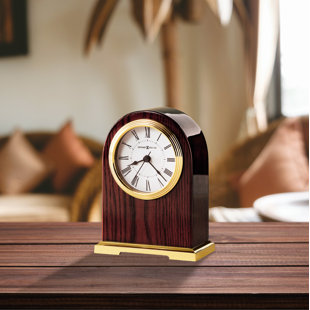 HOWARD MILLER® Carter Mid-Century Modern Roman Numeral Quartz Movement / Crystal Tabletop Clock in Rosewood Hall/Polished Brass