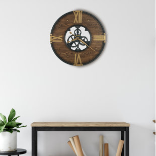 HOWARD MILLER® Murano Metal Wall Clock