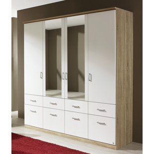RAUCH Bremen Revolving Door Wardrobe 4 Doors with Mirror and 8 Drawers