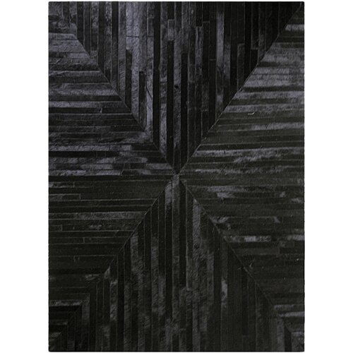 MadisonsInc Cowhide Geometric Area Rug in Black | Perigold